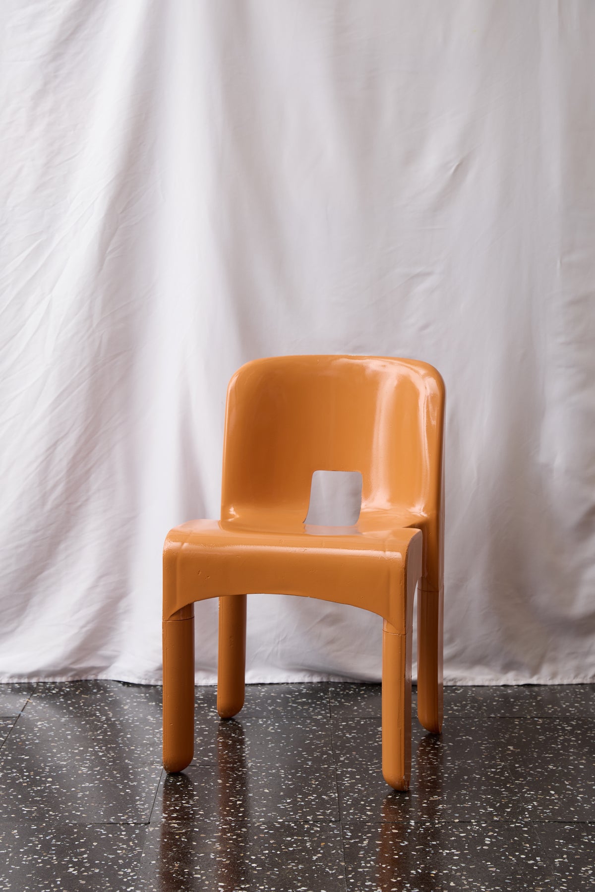 CH335 International Orange Universale Stacking Side Chair